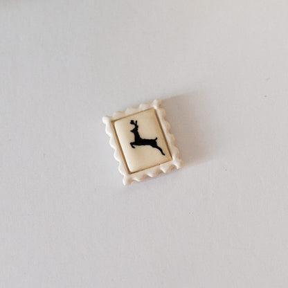 Reindeer Postage Stamp Ceramic Magnet